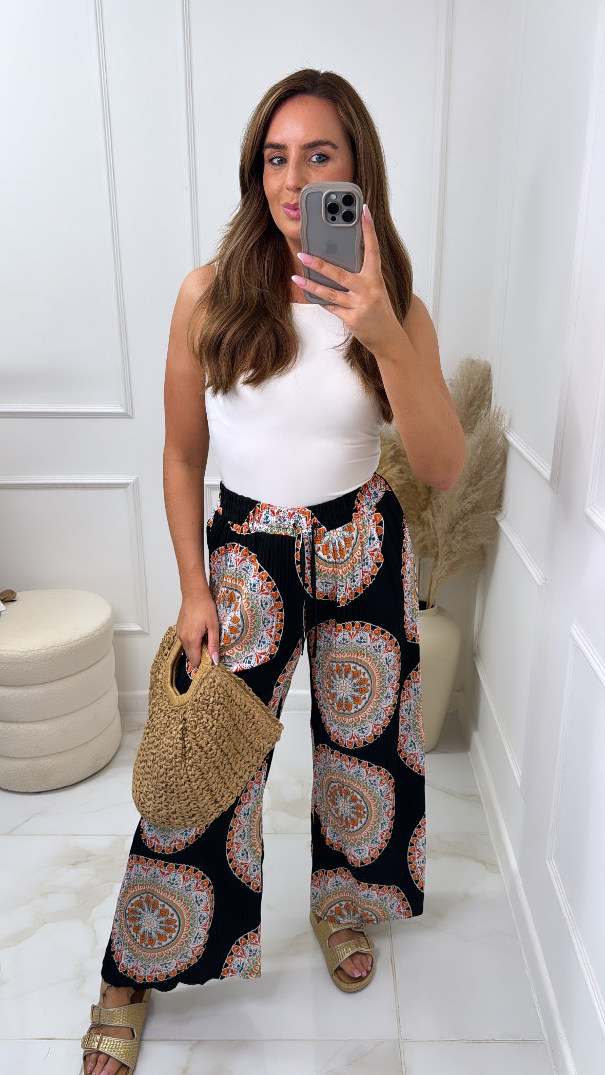 ARIA black circle print trousers