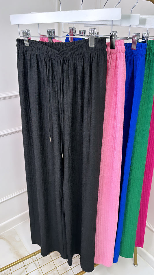 LOLA black textured wide leg trousers