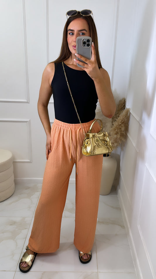 LOLA orange textured wide leg trousers